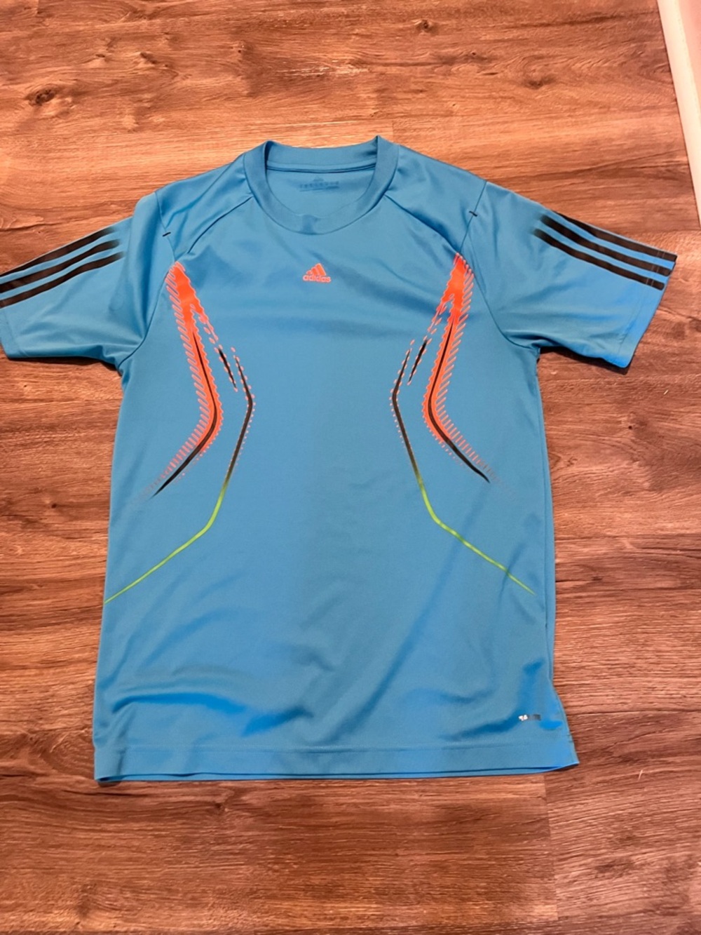 adidas Medium Men’s Light Blue Performance Tee with Orange & Lime Accents